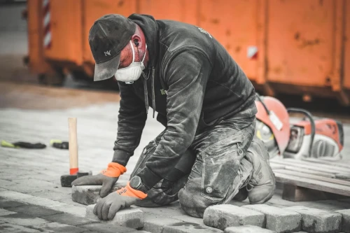 Man Working On Pavement